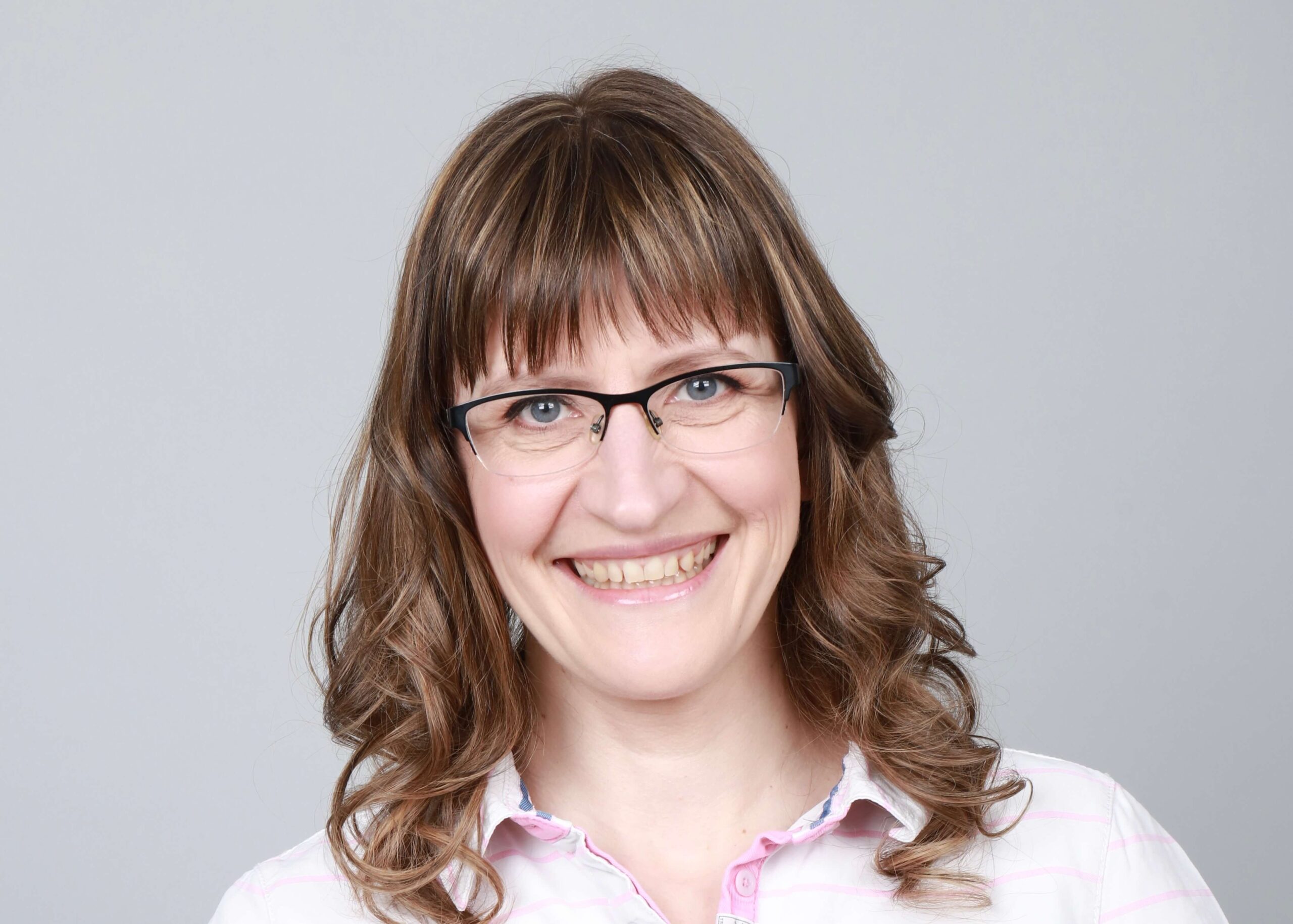 A woman's portrait against a white background