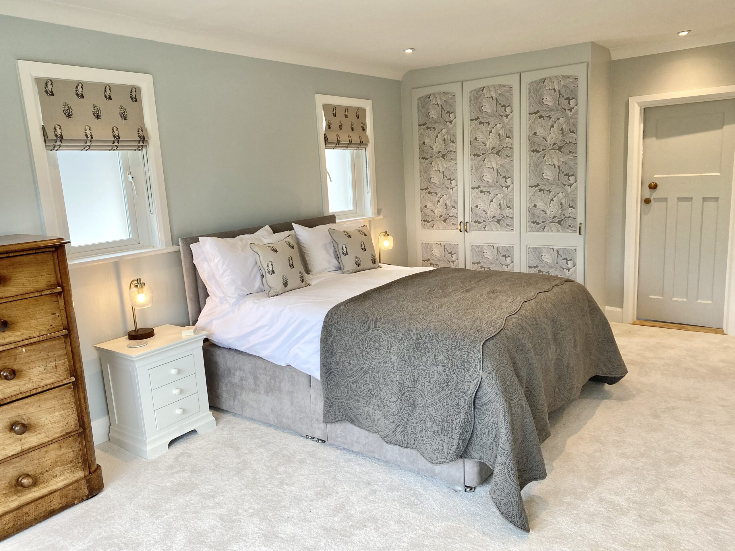 Master bedroom with bed and chest of drawers