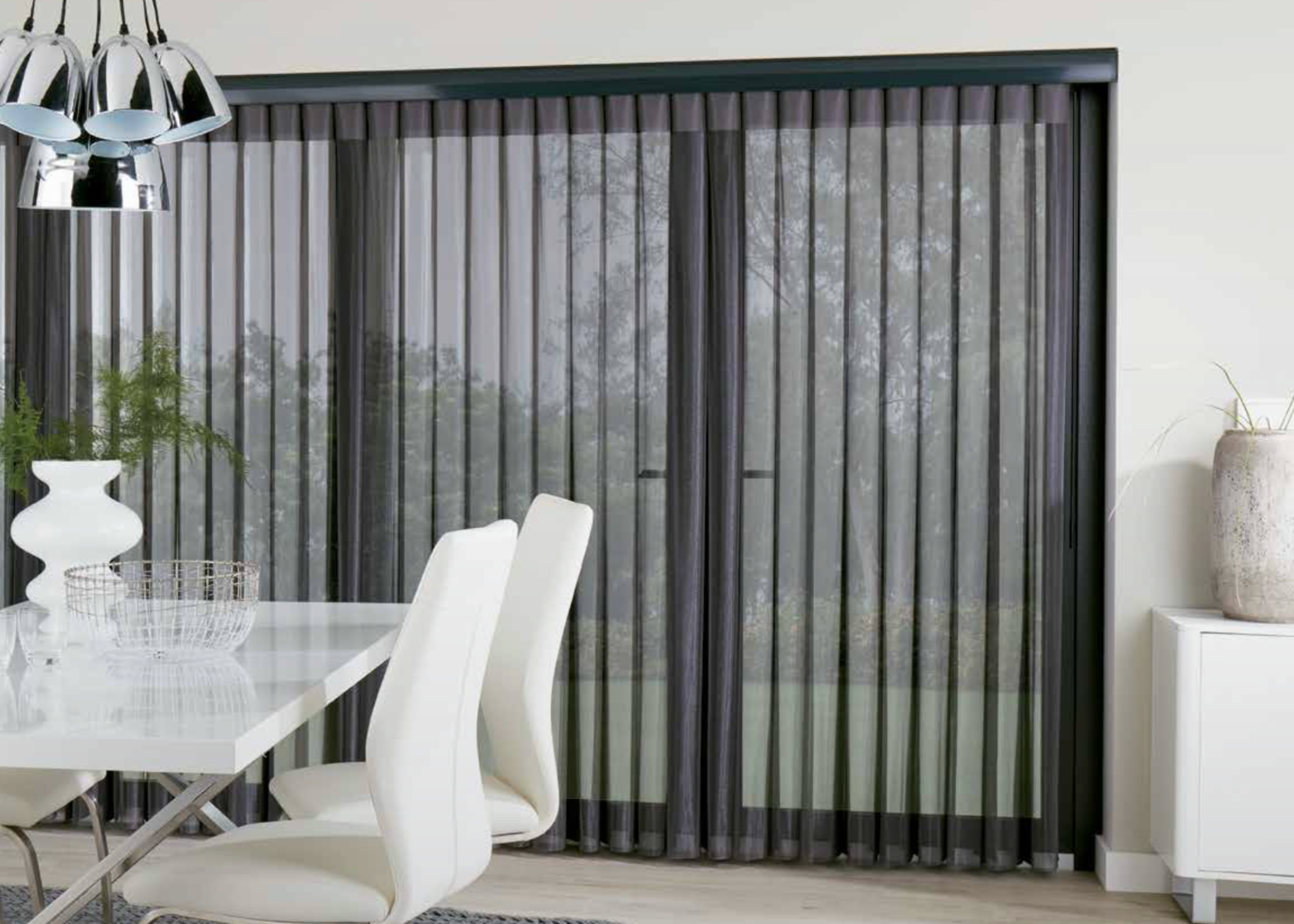 1 A white dining room with black veri shutters